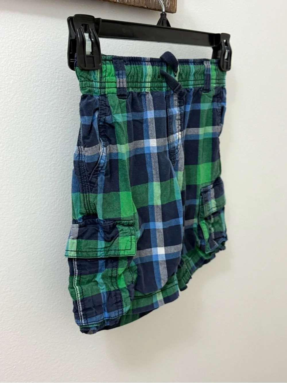 Gymboree boys green and navy blue plaid cargo shorts with an elastic waistband.